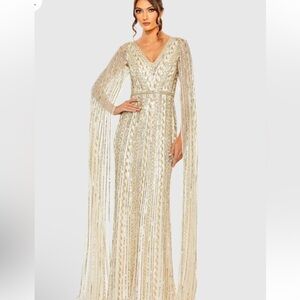 Gold Sequined V-Neck Gown with Cape Sleeves
MAC DUGGAL NEW WITH TAGS